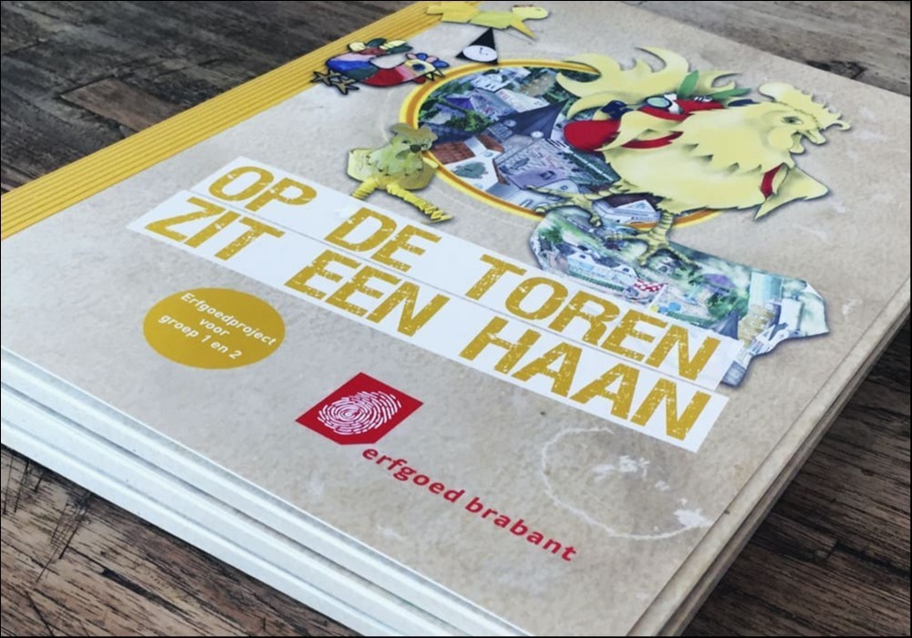 Op de toren zit een haan